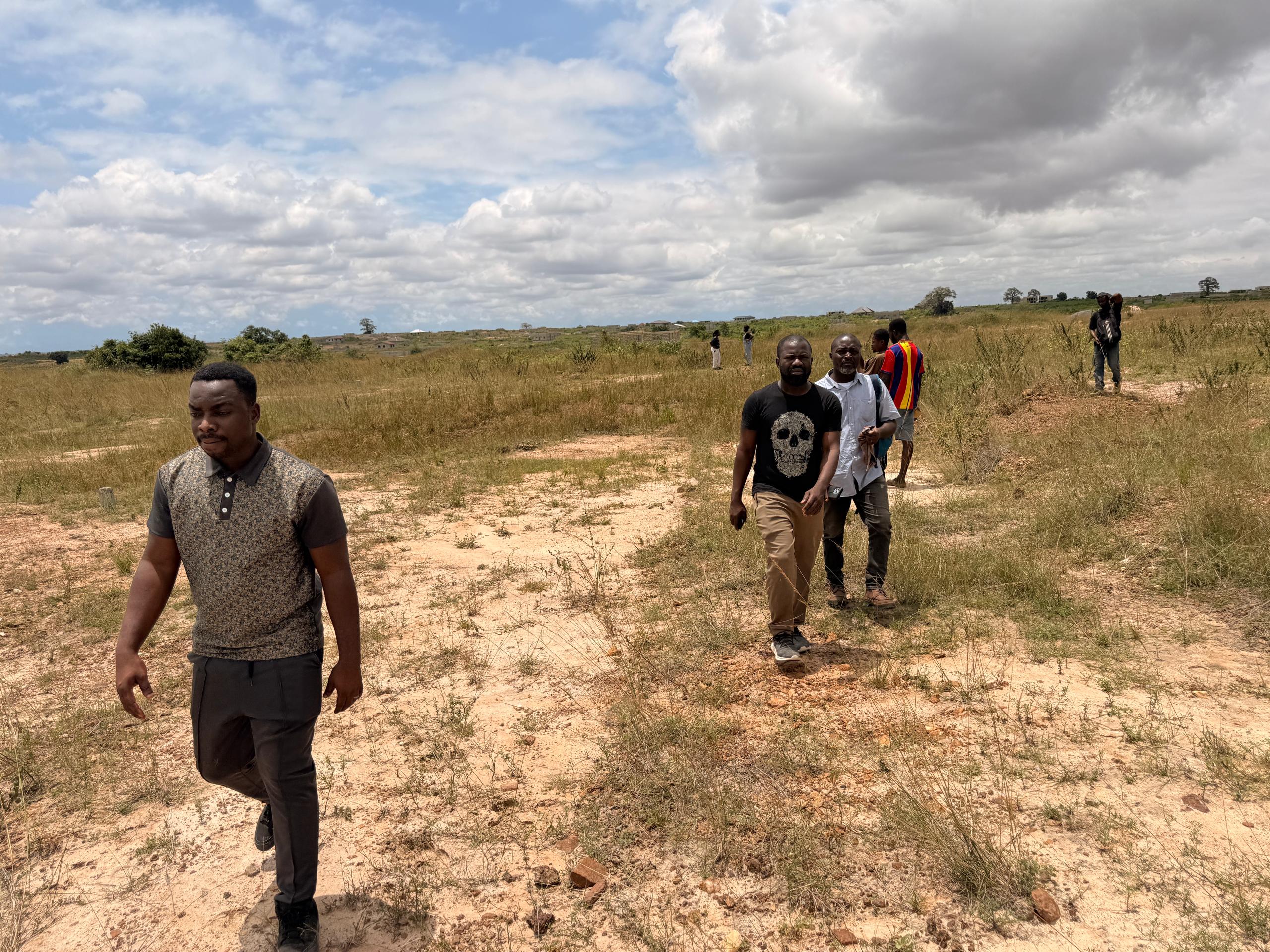 Survey team conducting a site inspection walk-through